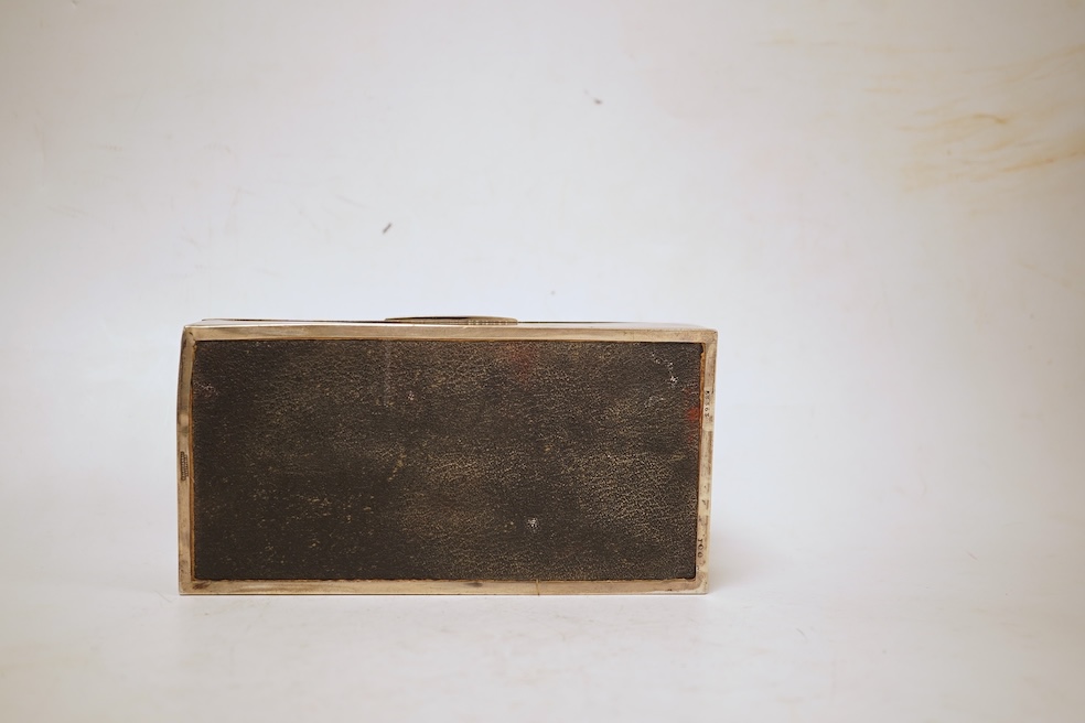 A George V rectangular plain silver cigarette box, Walker & Hall, Sheffield, 1929, 17.9cm.